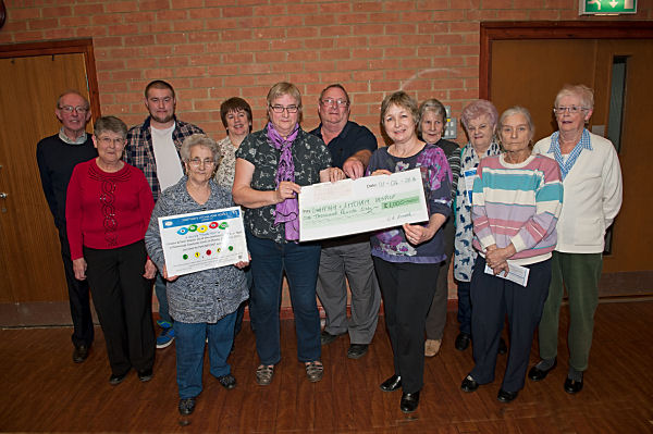 Presentation of money raised through Easter Bingo evening at Narborough 2016